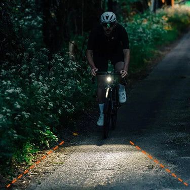 Magicshine EVO 1300 bike light mounted underneath, ideal for road cycling