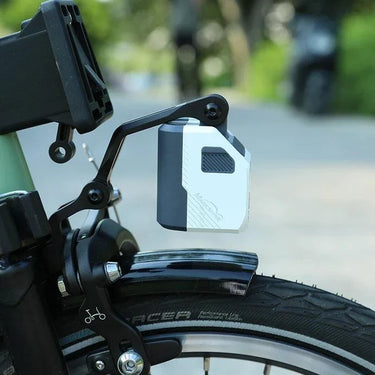 Magicshine GoPro Mount with adjustable and removable arms for Brompton folding bike fork, compatible with various action cameras and lights.