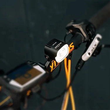 Magicshine ME 1000 smart e-bike light mounted on bicycle handlebar