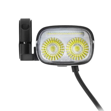 Magicshine ME 2000 smart e-bike light mounted on bicycle handlebars