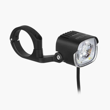 Magicshine ME 1000 smart e-bike light mounted on bike handlebars