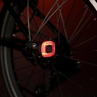 Magicshine MJ-6563 Taillight back mount installed on Brompton folding bike rear rack for secure light attachment