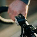 Magicshine ME 1000 smart e-bike light mounted on bike handlebars