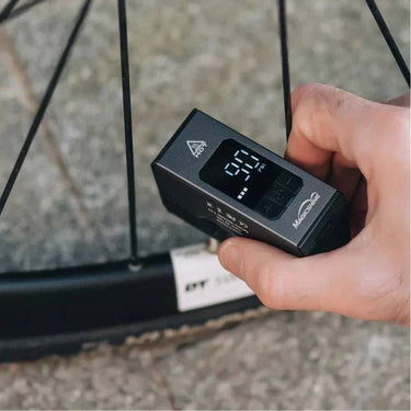 Magicshine AIRRO Mini bicycle tire inflator pump on white background