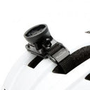 Magicshine Helmet Garmin Mount attached to white bicycle helmet with adjustable strap and mounting base.