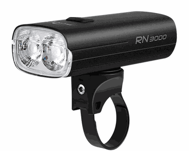 Magicshine RN 3000 front bike headlight mounted on black handlebar bracket